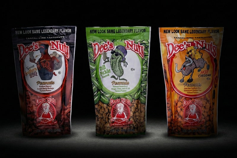 Three Dee’s Nuts flavored peanut snack packs displayed side by side, featuring BBQ, Dill Pickle Ranch, and Hot Cheddar flavors in colorful packaging, perfect for Valentine’s Day snack gift boxes.